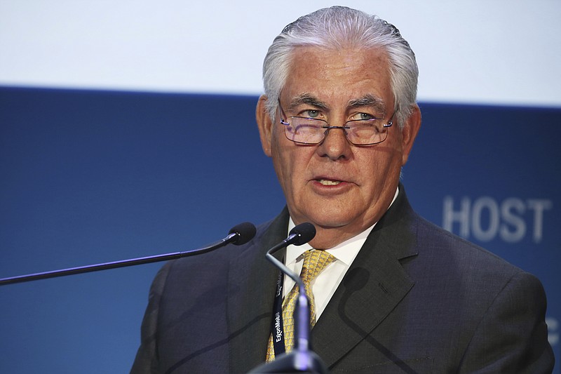 FILE - In this Nov. 7, 2016, file photo, ExxonMobil CEO and chairman Rex W. Tillerson gives a speech at the annual Abu Dhabi International Petroleum Exhibition & Conference in Abu Dhabi, United Arab Emirates. The Treasury Department hit Exxon Mobil Corp. with a $2 million fine on July 20, 2017, for violating Russia sanctions while Tillerson was the oil company’s CEO. Treasury said in a statement that Exxon under Tillerson’s leadership had shown “reckless disregard” for sanctions that the Obama administration imposed on Russian entities in 2014 over Russia’s annexation of Crimea. (AP Photo/Jon Gambrell, File)