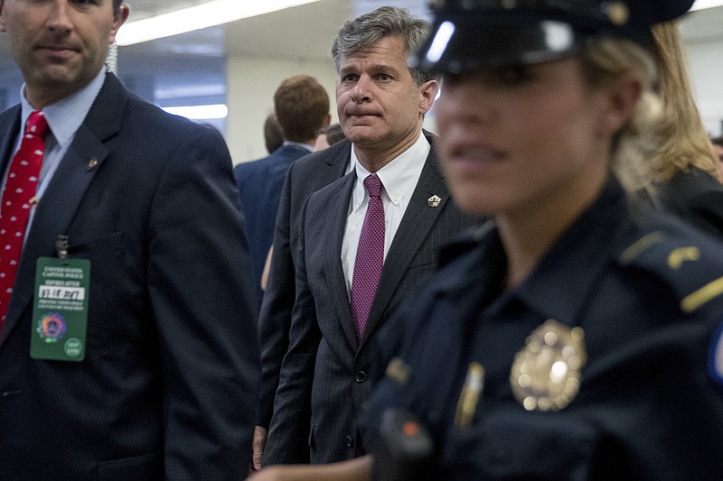 FBI Director nominee Christopher Wray walks on Capitol Hill in Washington, Tuesday, July 18, 2017. (AP Photo/Andrew Harnik)