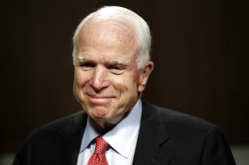  In this July 11, 2017, file photo, Sen. John McCain, R-Ariz., arrives on Capitol Hill in Washington. McCain has been diagnosed with a brain tumor after a blood clot was removed. 