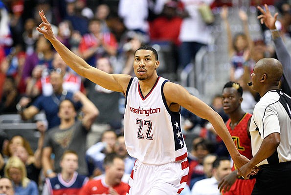 In this April 26 file photo, Wizards forward Otto Porter Jr. gestures after his 3-pointer during the second half in Game 5 of the team's playoff series against the Hawks in Washington.