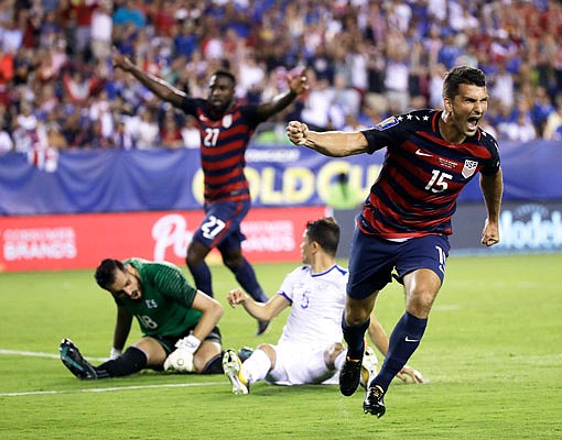 United States' Eric Lichaj (15) reacts after scoring Wednesday during a CONCACAF Gold Cup quarterfinal match against El Salvador in Philadelphia