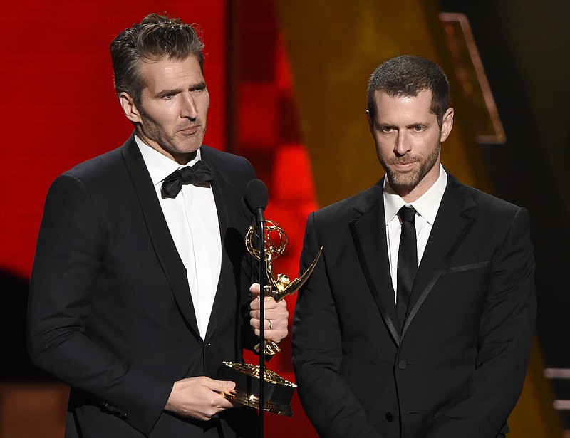 FILE - In this Sept. 20, 2015 file photo, creator-showrunners David Benioff, left, and D.B. Weiss accept the award for outstanding writing for a drama series for "Game Of Thrones" at the 67th Primetime Emmy Awards in Los Angeles. HBO’s announcement, Wednesday, July 19, 2017, that Benioff and Weiss will follow "Game of Thrones" with an HBO series in which slavery remains legal in the modern-day South drew fire on social media from those who fear that a pair of white producers are unfit to tell that story and that telling it will glorify racism. The series, “Confederate,” will take place in an alternate timeline where the southern states have successfully seceded from the Union and formed a nation in which legalized slavery has evolved into a modern institution. (Photo by Chris Pizzello/Invision/AP, File)