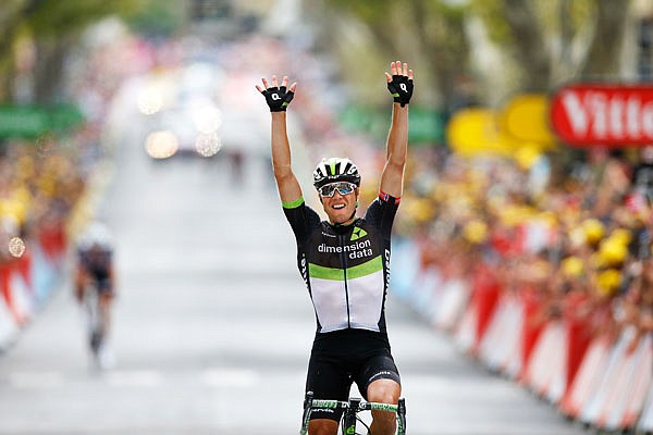Edvald Boasson Hagen celebrates as he crosses the finish line Friday to win the 19th stage of the Tour de France through 138.3 miles with a start in Embrun and a finish in Salon-de-Provence, France.