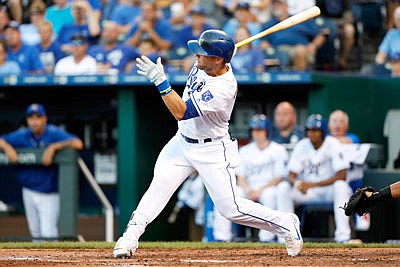 Alex Gordon of the Royals follows through on RBI single during the second inning of Friday's game against the White Sox at Kauffman Stadium in Kansas City. Whit Merrifield's sacrifice fly in the 10th inning lifted the Royals to a 7-6 victory against the White Sox. Merrifield flied out to Melky Cabrera to score Alcides Escobar, who led off the inning with a single.