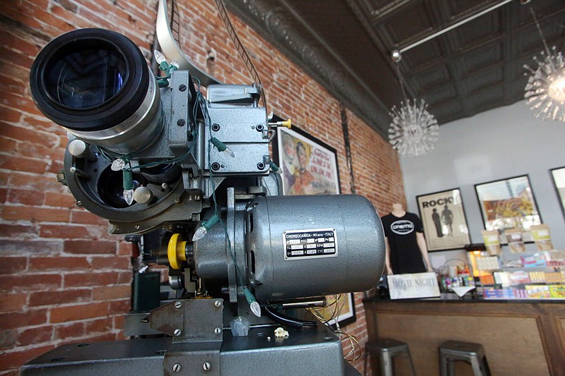 A historic projector is seen at Capitol City Cinema on Saturday, July 22, 2017 before the screening of "Vera's Vault." The cinema will be holding a fundraiser, starting Thursday, to purchase a digital projector.