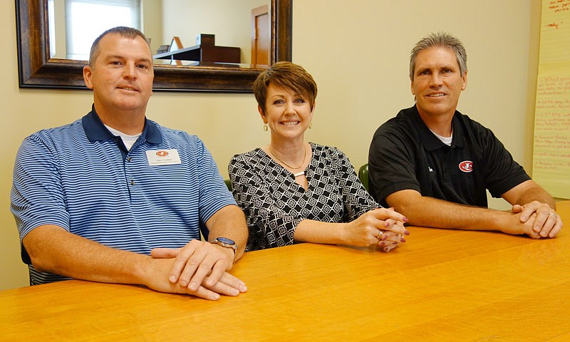 From left to right, Gary Verslues, Jefferson City Public Schools' assistant to the superintendent of
secondary education; Lorie Rost, assistant to the superintendent of elementary
education; and Brian Shindorf, chief of learning.