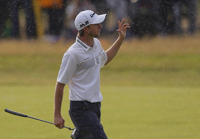 Canada's Austin Connelly acknowledges the crowd as he walks along the 18th fairway during the third round of the British Open Golf Championship, at Royal Birkdale, Southport, England, Saturday July 22, 2017. 