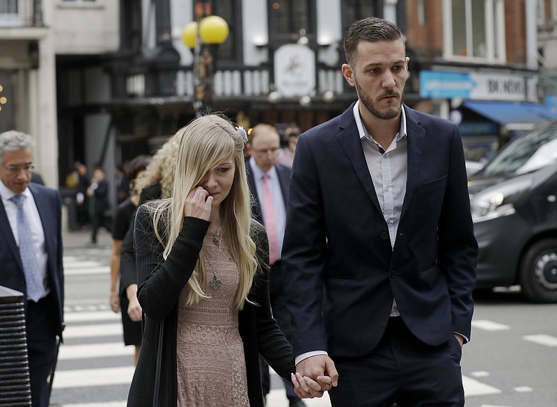 <p>AP</p><p>The parents of critically ill baby Charlie Gard, Connie Yates and Chris Gard, arrive at the High Court in London.</p>