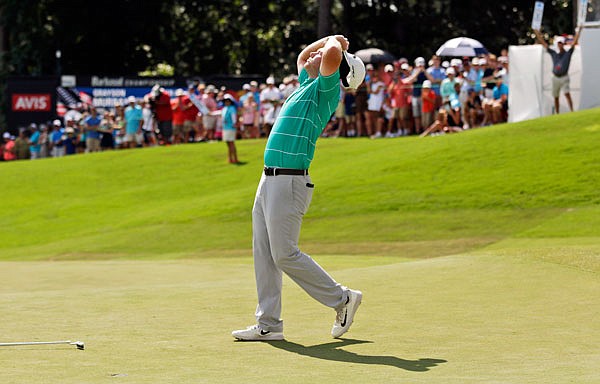 Grayson Murray reacts after sinking a putt on the 18th green Sunday to win the Barbasol Championship in Opelika, Ala.