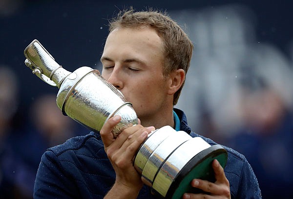 Jordan Spieth kisses the trophy Sunday after winning the British Open at Royal Birkdale in Southport, England.