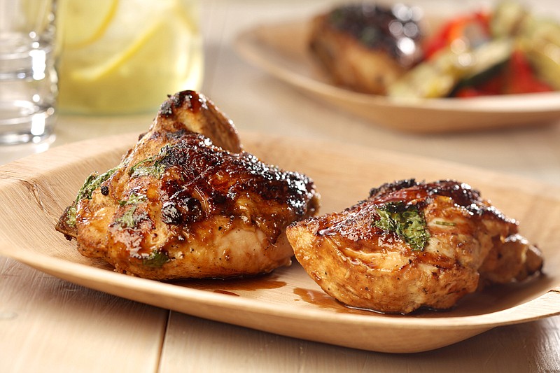 Give chicken a long bath in a coconut, lime, jalapeno and ginger marinade before grilling.