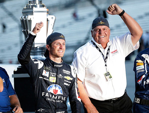 Kasey Kahne (left) celebrates with car owner Rick Hendrick after winning the Brickyard 400 on Sunday at Indianapolis Motor Speedway in Indianapolis.
