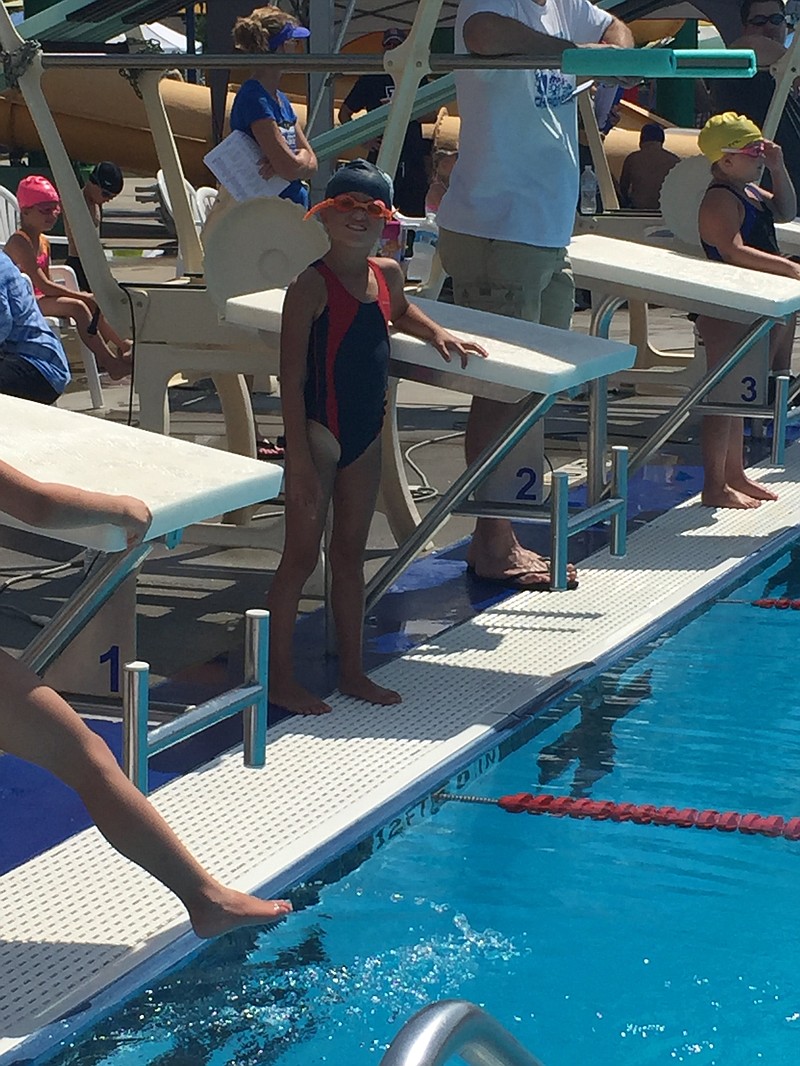 5-year old Addelyn McGill waits for her turn during the girls 6 & under 25-meter backstroke event. (Submitted photo)