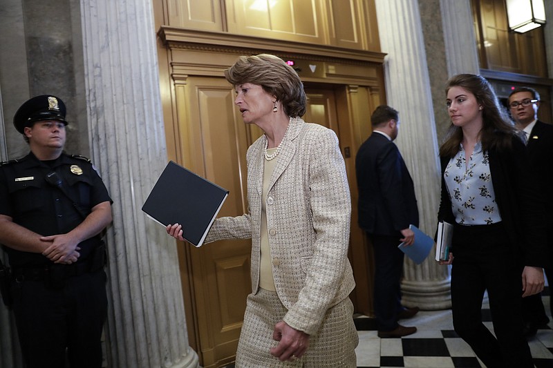 Sen. Lisa Murkowski, R-Alaska, arrives for a vote as the Republican-run Senate rejected a GOP proposal to scuttle President Barack Obama's health care law and give Congress two years to devise a replacement, Wednesday, July 26, 2017, at the Capitol in Washington. President Donald Trump and Senate Majority Leader Mitch McConnell, R-Ky., have been stymied by opposition from within the Republican ranks. (AP Photo/J. Scott Applewhite)