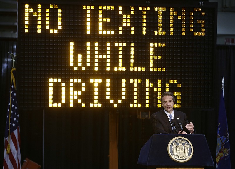 FILE - In this May 31, 2013 file photo, New York Gov. Andrew Cuomo speaks during a news conference to announce the increase in penalties for texting while driving in New York. (AP Photo/Frank Franklin II, File)