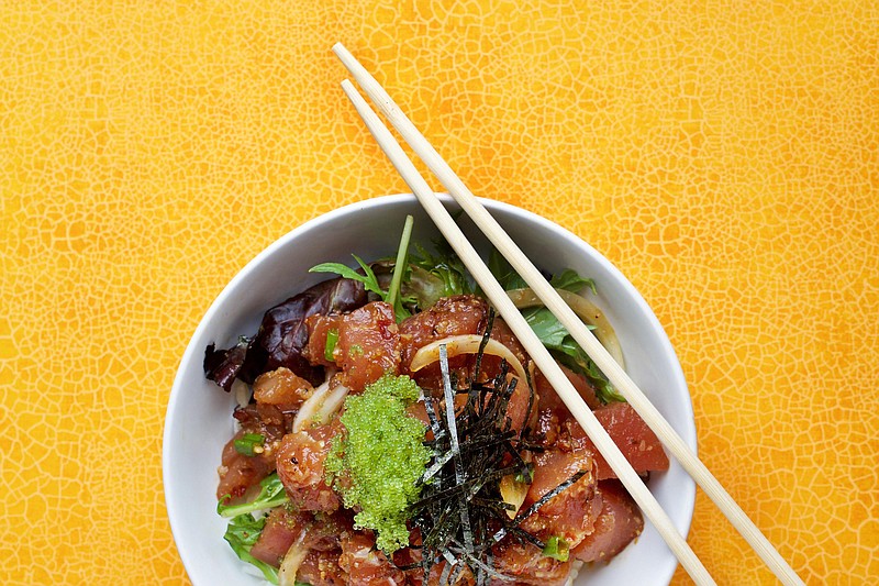 The Abunai Bowl, with ahi tuna, white onions, spring mix and rice, at Abunai in downtown Washington, which was founded by Akina Harada, who has Native Hawaiian ancestry. MUST CREDIT: Washington Post photo by Deb Lindsey for The Washington Post.