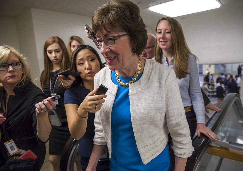 Sen. Susan Collins, R-Maine is surrounded by reporters as she heads to the Senate on Capitol Hill in Washington, Thursday, July 27, 2017, while the Republican majority in Congress remains stymied by their inability to fulfill their political promise to repeal and replace "Obamacare" because of opposition and wavering within the GOP ranks.