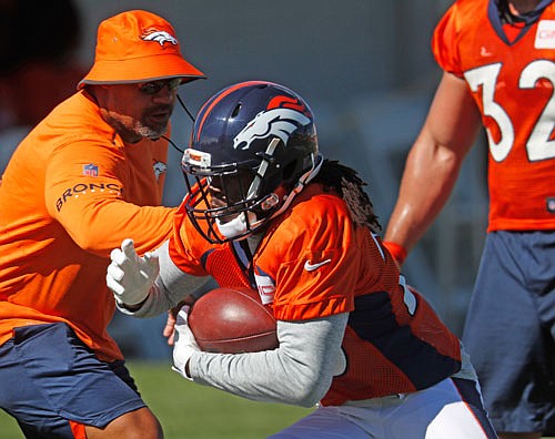 Broncos running back Jamaal Charles takes part in drills Thursday during training camp in Englewood, Colo.