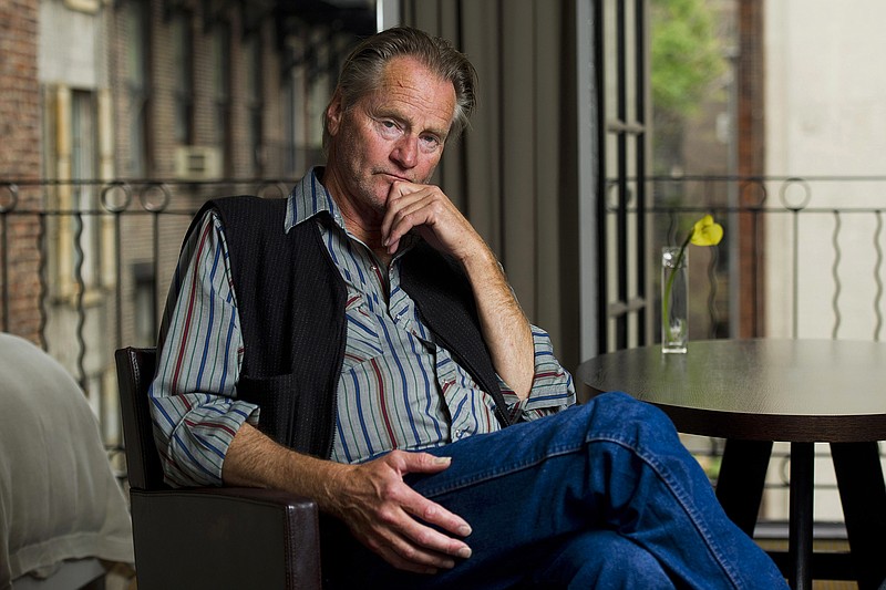 FILE - In this Sept. 29, 2011 file photo, actor Sam Shepard poses for a portrait in New York. Shepard, the Pulitzer Prize-winning playwright, Oscar-nominated actor and celebrated author whose plays chronicled the explosive fault lines of family and masculinity in the American West, died of complications from ALS, Thursday, July 27, 2017, at his home in Kentucky.  He was 73.  (AP Photo/Charles Sykes, File)