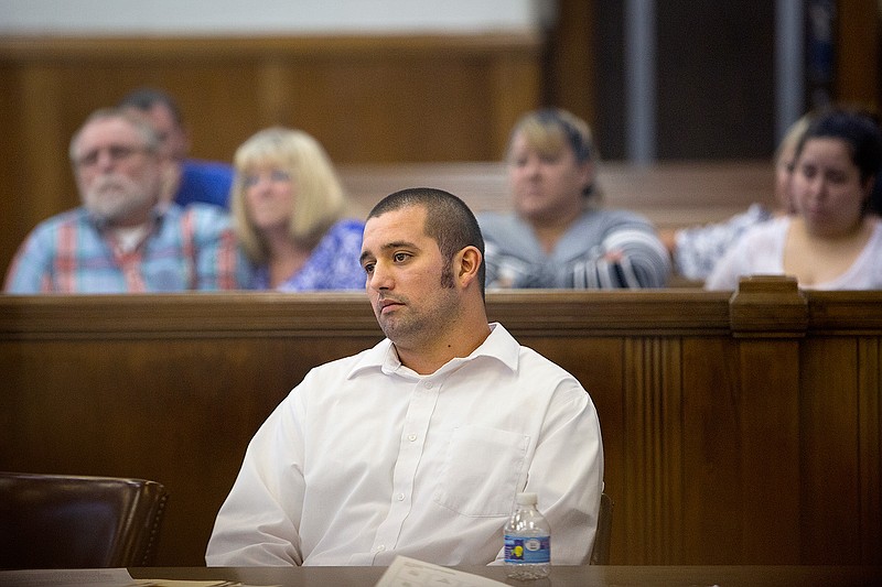 Taylor Rogers listens to arguments in his manslaughter trial Thursday at the Miller County Courthouse near downtown Texarkana. Rogers is accused of punching Jon Paul Russell, 32, in the face Aug. 29, 2015, at the Electric Cowboy nightclub in Texarkana, Ark. Russell suffered a traumatic brain injury after the punch caused him to fall and hit his head.
