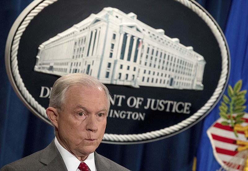 Attorney General Jeff Sessions attends a news conference at the Justice Department in Washington, Friday, Aug. 4, 2017.  Sessions has warned of a crackdown on marijuana. But documents obtained by The Associated Press show he’s getting no fresh avenues from a special task force formed to find the best strategy.  (AP Andrew Harnik)