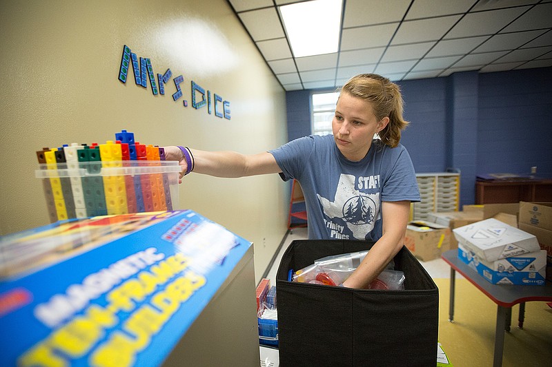 Liberty-Eylau kindergarten teacher Shelby Dice moves into her new classroom Friday afternoon on the Early Childhood Center campus. The L-E pre-K campus is expanding for the 2017-18 school year with the addition of kindergarten now taught at this campus while the Rock School is under construction. The school year starts on Aug. 14. This is Dice's second year with the district.