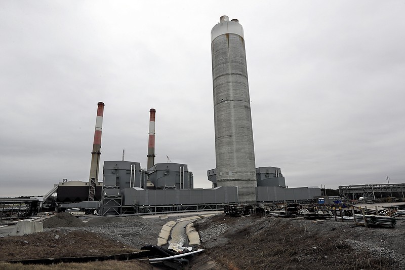 FILE - This Jan. 25, 2017 file photo shows the Gallatin Fossil Plant in Gallatin, Tenn. A federal judge on Friday, AUG. 4, 2017 ordered the nation’s largest public utility to dig up its coal ash at Tennessee Valley Authority’s Gallatin Fossil Plant and move it to a lined waste site where it doesn’t risk further polluting the Cumberland River.(AP Photo/Mark Humphrey, File)
