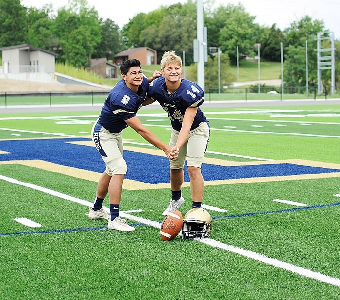 Helias teammates Daniel Rhea and Jeremiah Heckman pose together Saturday morning, Aug. 5, 2017 during Media Day at Ray Hentges Stadium.