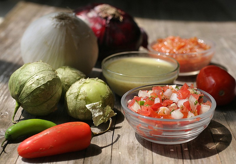 Homemade salsas are easy to make and use fresh in-season ingredients. Pictured from front to back: pico de gallo, salsa verde, and Olivia's salsa. 
