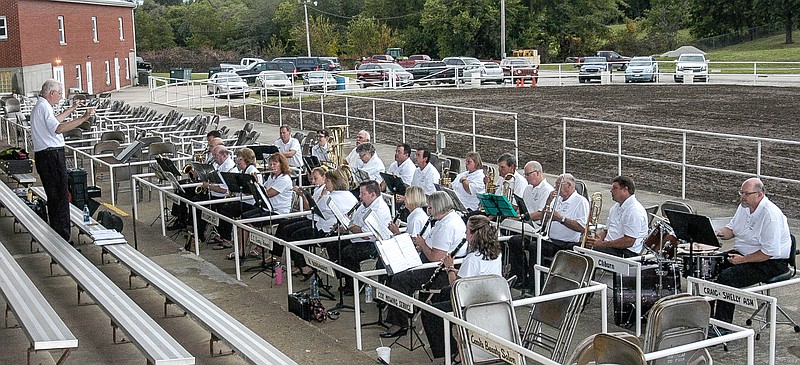 The California Community Ensemble, directed by Phil Lewis, performs in the main arena at the Moniteau County Fairgrounds Aug. 6, 2017.