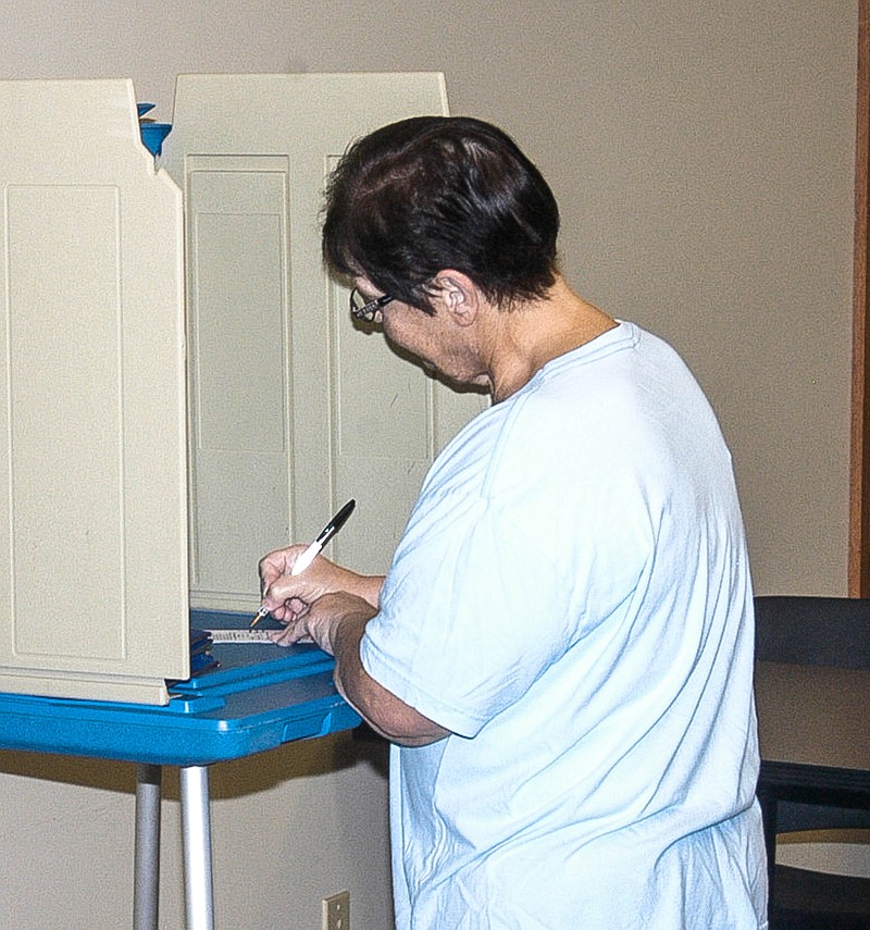 California resident Patty Moore casts a vote in the special primary election Aug. 8, 2017 at the California City Hall, as Election Judges Mary Oesterly and Ramona Hader look on. Only the 50th House District and the City of Tipton voted in this election. The residents of the City of Tipton voted only on city property tax support for the Price James Library. In Moniteau County, the 50th District includes only the north part of the county, and the ballot contains only the race to replace District 50 Representative Caleb Jones, who resigned to take a position in Gov. Eric Greitens administration. The residents of the City of Tipton voted only on city property tax support for the Price James Library.