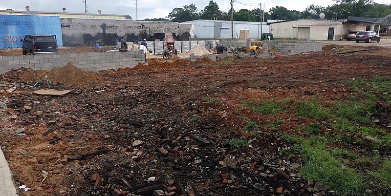 This is the open space on East Hiram in Atlanta which will be turned into both an expanded parking area and a community park.