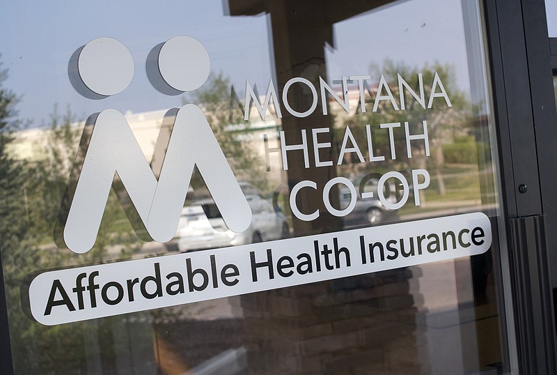 This Friday, Aug. 11, 2017 photo shows the offices of the Montana Health Co-op in Helena, Mont. The Montana Health Co-op resumes accepting new enrollees on Sunday, Aug. 13, 2017 after withdrawing from the state's health insurance exchange last year amid worries about its financial health. Chief Executive Officer Jerry Dworak asserts that the co-op is in position to absorb all 64, 000 Montanans who buy policies from the state's health insurance exchange. (AP photo/Bobby Caina Calvan)