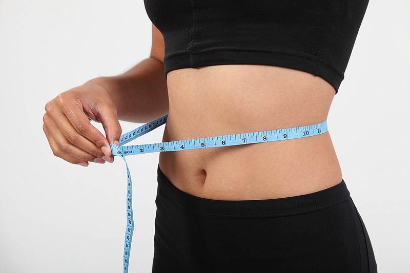 <p>Dreamstime</p><p>Measuring your waist circumference helps identify the presence of dangerous abdominal fat.</p>