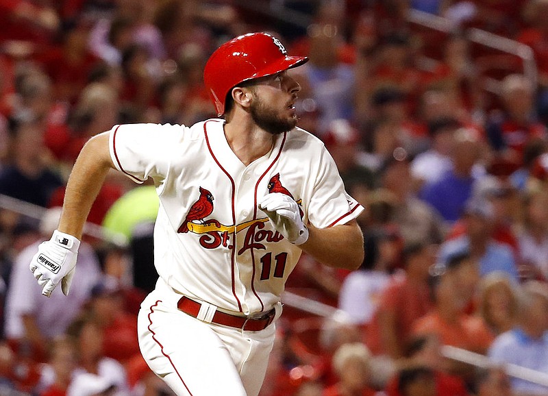 St. Louis Cardinals' Paul DeJong watches his solo home run during the seventh inning of a baseball game against the Atlanta Braves on Saturday, Aug. 12, 2017, in St. Louis. 