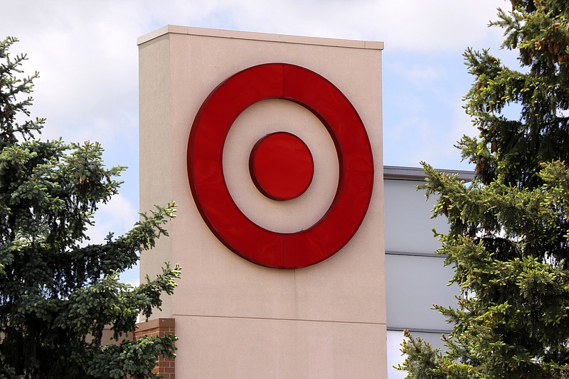 This May 3, 2017, photo shows the logo on a Target store in Upper Saint Clair, Pa. Target says it is buying delivery logistics company Grand Junction to help it offer same-day delivery service to its in-store shoppers. Grand Junction’s software connects retailers with about 700 delivery companies around the country that pick up items from distribution centers and take them to customers. (AP Photo/Gene J. Puskar)