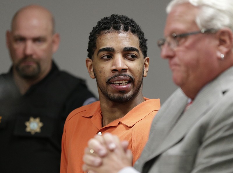 Wesley Correa-Carmenaty, 24, who pleaded guilty to murder and 11 other counts for killing a western Iowa sheriff's deputy and wounding another during a jail escape, addresses the court and family of the victim after he was sentenced to life in prison without parole during a court hearing in Council Bluffs, Iowa, Tuesday, Aug. 15, 2017. (AP Photo/Nati Harnik)