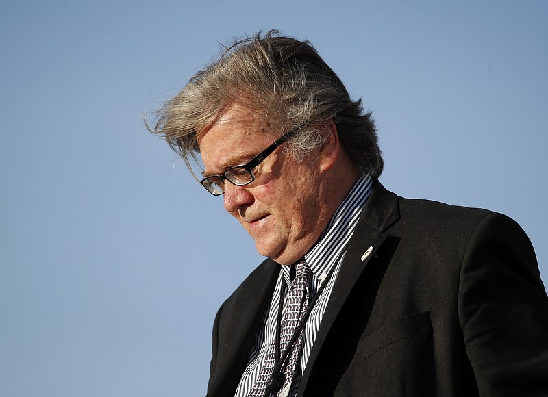 FILE - In this April 9, 2017, file photo, White House chief strategist Steve Bannon steps off Air Force One at Andrews Air Force Base, Md. Bannon was with President Donald Trump on his return trip from Florida. Trump won’t say whether he plans to keep Steve Bannon, a onetime top adviser and key campaign strategist, in the White House. “We’ll see what happens with Mr. Bannon,” Trump said at an impromptu news conference on Aug. 15 where he fielded questions about his confidence in his adviser. (AP Photo/Alex Brandon, File)
