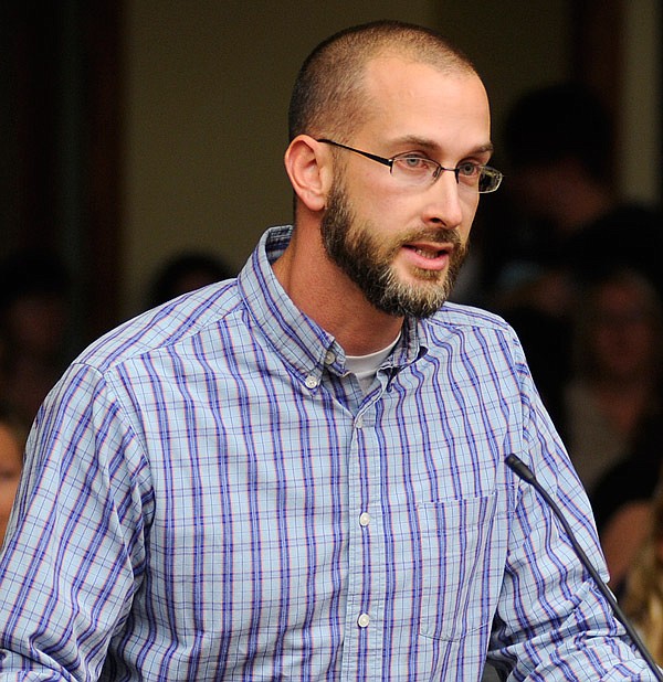In this Oct. 13, 2014 file photo, East Elementary teacher Aaron DeSha addresses the Jefferson City Schools Board of Education about classroom discipline issues. On Aug. 15, 2017, the State Board of Education revoked the teaching license of De Sha, who had resigned from his job Jan. 4, 2016 following an earlier incident in which he pushed and injured a student.
