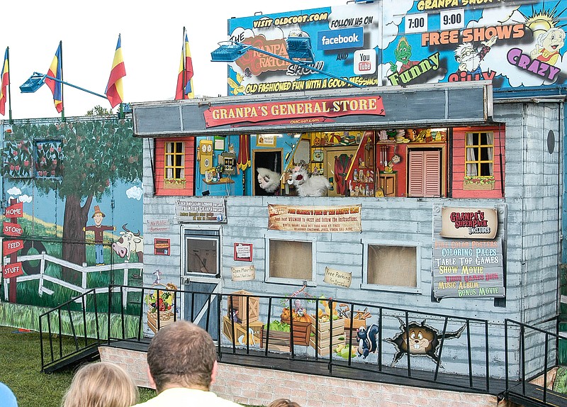 At the 2017 Moniteau County Fair, the audience shows enjoyment for the antics of Granpa Cratchet, as he and his helper, Clem, do some remodeling on the home of Granma. The show was presented each day Aug. 8-11.