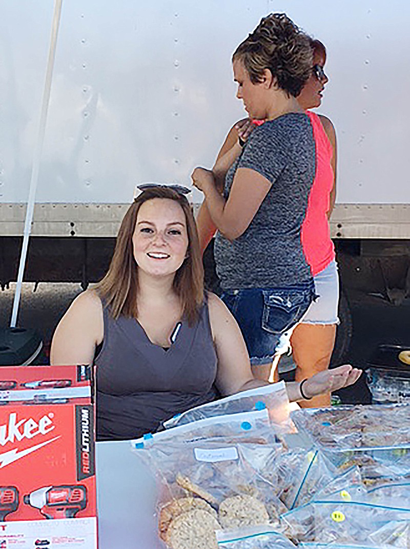 <p>Photo submitted</p><p>Brooke Ziehmer, in a wheelchair, is present at the fundraiser held on her behalf on Aug.</p>