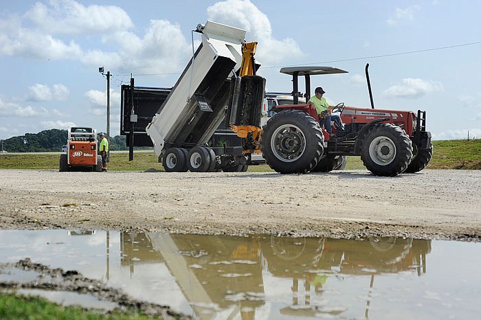 Parks, and Recreation maintenance employess make improvements to the North Jefferson City Recreational Area. The city is expecting thousands of visitors for the solar eclipse, and the area will function as a campground for the weekend.