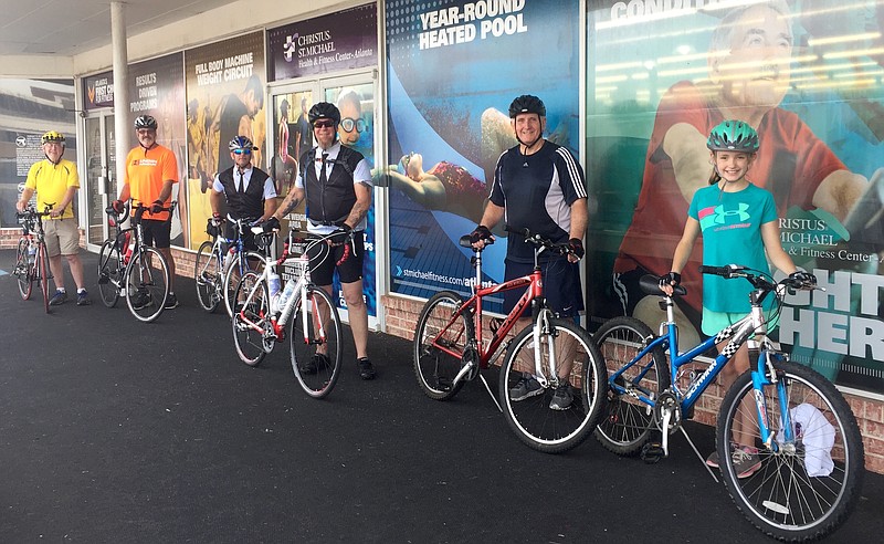 These colorful bike riders have cycled down to work out at CHRISTUS St. Micheal Health and Fitness Center in Atlanta, Texas. From left, they are Jerry Harp, Roger Warren, Rodney Bynum, Jonathan Cornett, Richard York and his daughter Abbie. 