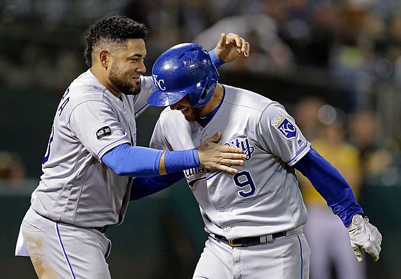 Drew Butera (right) celebrates with Melky Cabrera after hitting a two-run home run off Santiago Casilla of the Athletics in the eighth inning of Tuesday night's game in Oakland, Calif.