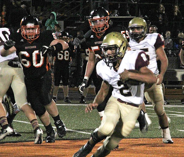 Eldon running back Isaiah Merida carries the ball in last season's district championship game at Owensville.