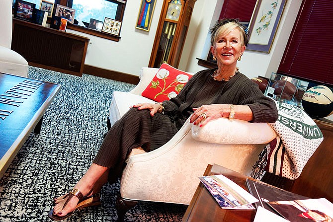 Jahnae H. Barnett, president of William Woods University, sits Wednesday in her office.