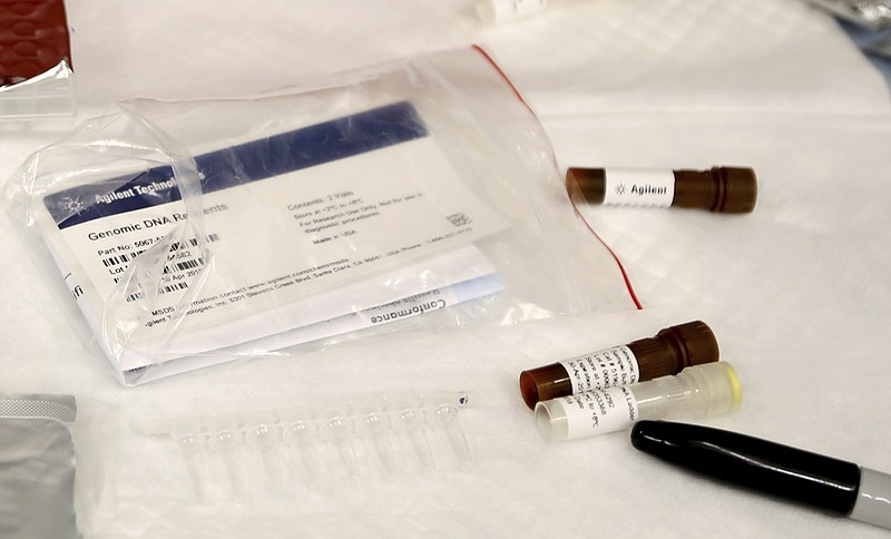 DNA testing equipment is left on a work mat at the Center for Human Identification research and development lab at the University of North Texas on Monday, July 31, 2017, in Fort Worth, Texas. The university's case lab, which tests DNA for missing people and unidentified dead, has temporarily stopped accepting cases outside Texas after the National Institute of Justice opted not to offer millions of dollars in grants for DNA technology to identify missing people. (AP Photo/Jaime Dunaway)