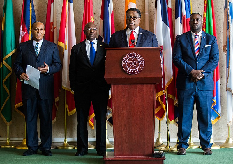 African American Dallas City Council members, from left, Kevin Felder, Tennell Atkins, Mayor Pro Tem Dwaine Caraway and Casey Thomas speak at a news conference Friday, Aug. 18, 2017, at City Hall in Dallas calling for the city's Confederate statues to be removed as a way to heal the area's racist history. 
