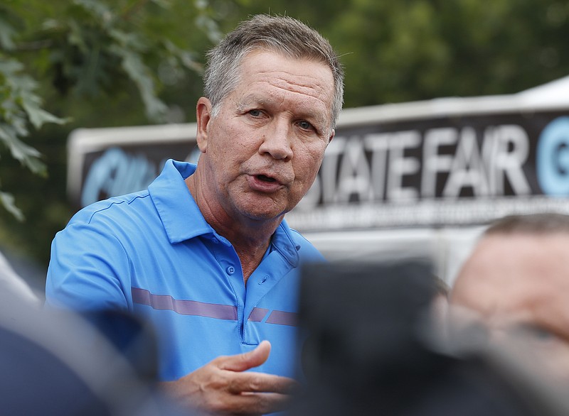 FILE - In a July 27, 2017 file photo, Ohio Gov. John Kasich speaks at a news conference at the Ohio State Fair, in Columbus, Ohio.  Kasich says Sunday, Aug. 20, 2017, that President Donald Trump needs to stop the staff chaos at the White House and "settle it down." Kasich is among those who fear the staff churn is hampering Trump's ability to notch a major legislative victory. (AP Photo/Jay LaPrete, File)