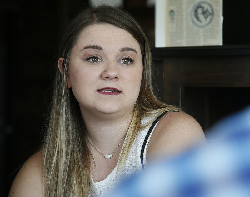 In this Wednesday, Aug. 9, 2017 photo, Danyelle Dyer talks during an interview in Edmond, Okla. Dyer had to obtain a court order after the man who molested her when she was 7 years old moved in next door. (AP Photo/Sue Ogrocki)